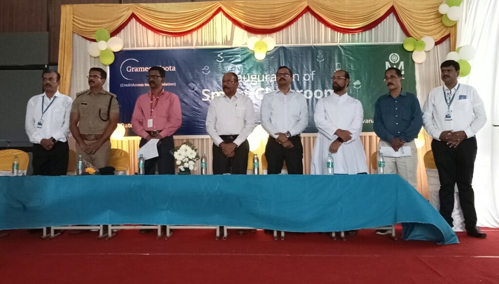 Standing from left to right on the dais: Mr. Jagadeesh Begur, GM, CA Grameen, Mr. Arun Kumar, KPS- ACP, Mr. Ramachandran, IPS-SP, Mr. George Joseph -Chairman CA Grameen, Mr. Ganesh Narayanan -Dy.CEO and CBO, CA Grameen, Father Saji, Kamukincode Church, Mr. Ravi Kumar, CIMR committee member, Mr. Manjunath, Business Head -TN & Kerala.