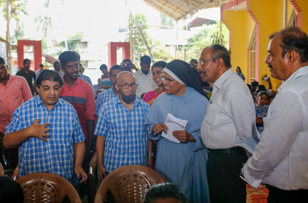 Mr. George Joseph and Sr. Elise Mary interacting with students