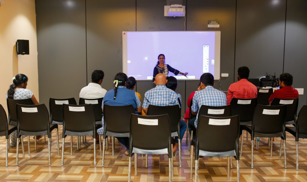 Students and teacher at the smart classroom